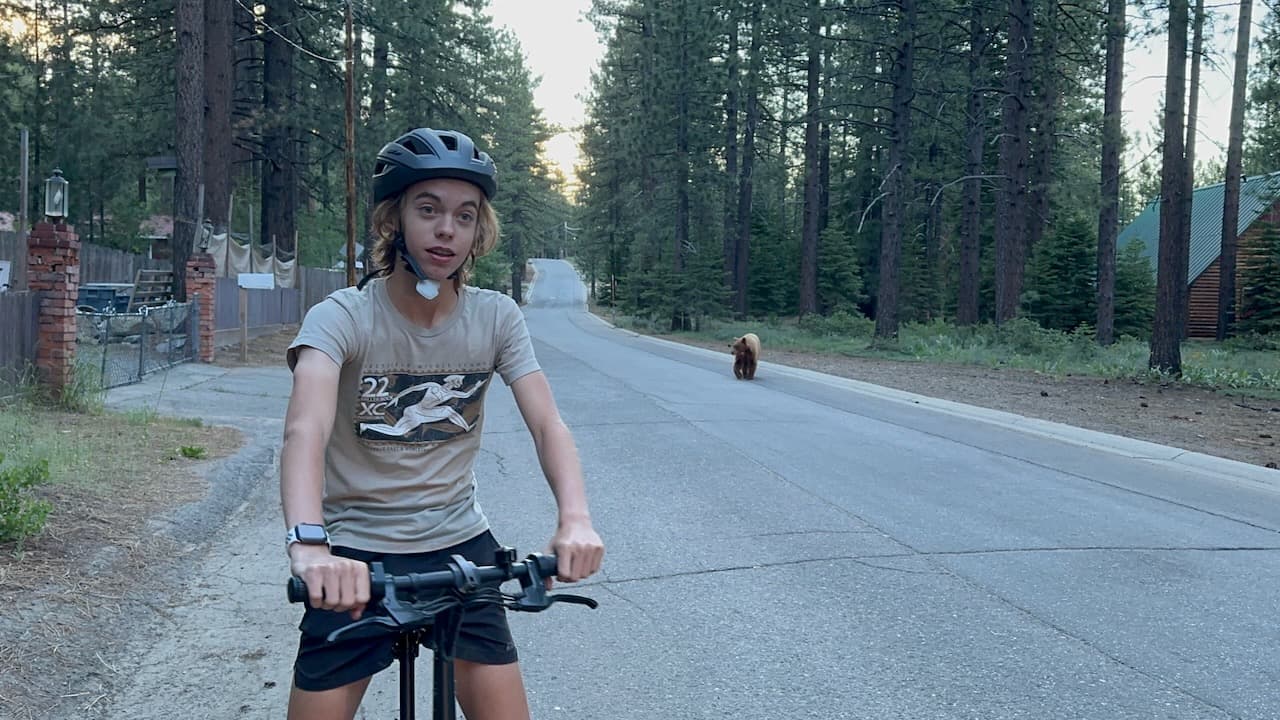 Our nephew, Dexter, spotting a bear on a bike ride near the house